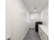 Clean laundry room with modern washer, dryer, and cabinets at 5219 Iron River Ct, Las Vegas, NV 89135
