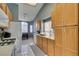 Bright kitchen with white appliances and wood cabinets at 5524 Desert Valley Dr, Las Vegas, NV 89149