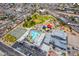 Aerial view of community center with pool, playground, and tennis courts at 5751 E Hacienda Ave # 118, Las Vegas, NV 89122