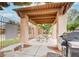 Outdoor BBQ area with covered seating and a grill at 5751 E Hacienda Ave # 118, Las Vegas, NV 89122