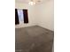 Spacious carpeted bedroom with window at 5751 E Hacienda Ave # 118, Las Vegas, NV 89122