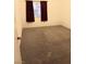 Spacious carpeted bedroom with window at 5751 E Hacienda Ave # 118, Las Vegas, NV 89122