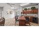 Community kitchen with a breakfast bar and modern appliances at 5751 E Hacienda Ave # 118, Las Vegas, NV 89122