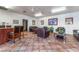 Community room with leather couches, tiled floor, and a seating area at 5751 E Hacienda Ave # 118, Las Vegas, NV 89122