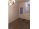 Bright dining area with window and carpet flooring at 5751 E Hacienda Ave # 118, Las Vegas, NV 89122
