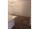 Bright dining area with a chandelier and carpet flooring at 5751 E Hacienda Ave # 118, Las Vegas, NV 89122