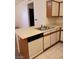 Kitchen features a dishwasher and double sink at 5751 E Hacienda Ave # 118, Las Vegas, NV 89122