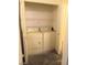 Convenient laundry closet with shelving at 5751 E Hacienda Ave # 118, Las Vegas, NV 89122