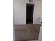 Carpeted living room with view of kitchen at 5751 E Hacienda Ave # 118, Las Vegas, NV 89122