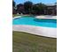 Relaxing kidney-shaped pool with spa and loungers at 5751 E Hacienda Ave # 118, Las Vegas, NV 89122