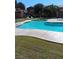 Refreshing kidney-shaped pool with spa and loungers at 5751 E Hacienda Ave # 118, Las Vegas, NV 89122
