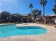 Community pool with patio furniture and a hot tub at 5751 E Hacienda Ave # 118, Las Vegas, NV 89122