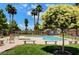 Inviting kidney-shaped pool with ample seating at 5751 E Hacienda Ave # 118, Las Vegas, NV 89122