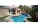 Relaxing pool and spa area with lush landscaping at 5851 Magini Ave, Las Vegas, NV 89141