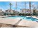 Refreshing community pool with surrounding patio at 6701 Squaw Mountain Dr # 203, Las Vegas, NV 89130