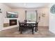Cozy dining area with fireplace and built-in shelving at 6701 Squaw Mountain Dr # 203, Las Vegas, NV 89130