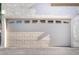 Attached garage with automatic door opener at 6701 Squaw Mountain Dr # 203, Las Vegas, NV 89130