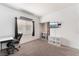 Bedroom with a desk, chair, and built-in shelving at 6701 Squaw Mountain Dr # 203, Las Vegas, NV 89130