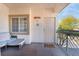 Private patio with seating and entry door at 6701 Squaw Mountain Dr # 203, Las Vegas, NV 89130