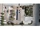 Aerial view of a home with a large yard, featuring mature trees and ample parking at 7390 W Rome Blvd, Las Vegas, NV 89131