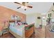 Bright bedroom with wood floors and a large bed at 7390 W Rome Blvd, Las Vegas, NV 89131