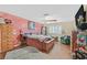 Bright bedroom with wood floors and a ceiling fan at 7390 W Rome Blvd, Las Vegas, NV 89131