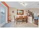 Cozy dining area with a wooden table and chairs near the kitchen at 7390 W Rome Blvd, Las Vegas, NV 89131