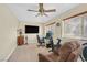 Home office with a ceiling fan and exercise equipment at 7390 W Rome Blvd, Las Vegas, NV 89131
