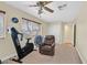 Home office with a ceiling fan and exercise equipment at 7390 W Rome Blvd, Las Vegas, NV 89131