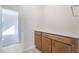 Hallway with wood-look floors, wood cabinetry and white countertops at 745 Black Palace St, Henderson, NV 89011