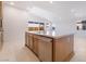 Stylish kitchen island featuring stainless steel appliances and a quartz countertop at 745 Black Palace St, Henderson, NV 89011