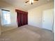 Bright bedroom with carpet flooring and window at 7633 Winterthur Ct, Las Vegas, NV 89129