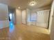 Entryway with hardwood flooring, storage lockers, and window bench seat at 7633 Winterthur Ct, Las Vegas, NV 89129