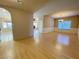 Spacious living space featuring laminate flooring, offering a versatile area for dining and relaxing with seamless flow at 7633 Winterthur Ct, Las Vegas, NV 89129