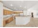 Spacious kitchen featuring oak cabinets and tile floors at 8080 Black Orchid Ave, Las Vegas, NV 89131