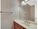 Simple, well-lit bathroom with marble vanity and modern fixtures at 9472 Ojibwa Ave, Las Vegas, NV 89149