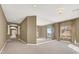 Spacious bedroom with mirrored wall and carpeting at 9472 Ojibwa Ave, Las Vegas, NV 89149