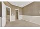 Bedroom with neutral walls and a walk-in closet at 9472 Ojibwa Ave, Las Vegas, NV 89149