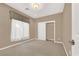 Spacious bedroom with large window and neutral wall paint at 9472 Ojibwa Ave, Las Vegas, NV 89149