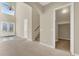 Bright and airy entryway with double doors and staircase at 9472 Ojibwa Ave, Las Vegas, NV 89149