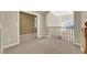 Upstairs hallway with carpeting and access to other rooms at 9472 Ojibwa Ave, Las Vegas, NV 89149