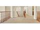 Upstairs hallway with carpeting and views to other rooms at 9472 Ojibwa Ave, Las Vegas, NV 89149