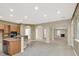 Open floor plan showing kitchen, living and dining areas at 9472 Ojibwa Ave, Las Vegas, NV 89149
