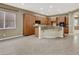 Open concept kitchen with curved island and granite at 9472 Ojibwa Ave, Las Vegas, NV 89149