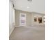 Bright living area with door leading to backyard at 9472 Ojibwa Ave, Las Vegas, NV 89149