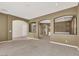 Open living area with decorative screen and arched entryways at 9472 Ojibwa Ave, Las Vegas, NV 89149
