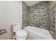 Clean bathroom with updated tile shower/tub combo at 1009 Beaver Crest Ter, Henderson, NV 89015