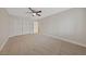 Bright bedroom featuring neutral carpet and double-door closet at 1009 Beaver Crest Ter, Henderson, NV 89015