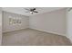 Spacious bedroom with neutral carpeting and ceiling fan at 1009 Beaver Crest Ter, Henderson, NV 89015