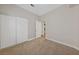 Bedroom with sliding door closet and access to hallway bathroom at 1009 Beaver Crest Ter, Henderson, NV 89015